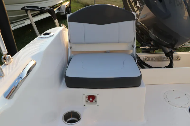 Slide: The Image of 2025 Robalo R160 Center Console boat seat with Yamaha engine in background. - 10