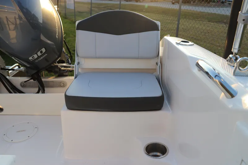 Slide: The Image of 2025 Robalo R160 Center Console boat seat with Yamaha 90 engine in background. - 12