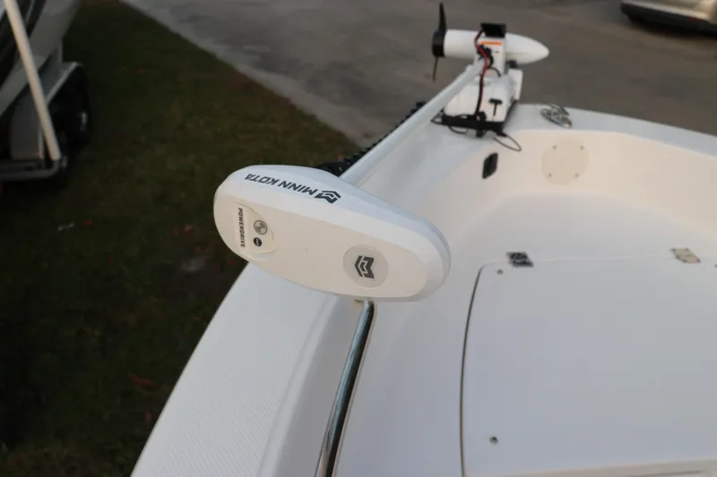 Slide: The Image of 2025 Robalo R160 Center Console with Minn Kota trolling motor. - 34
