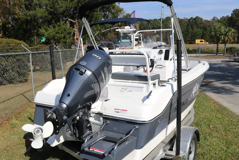 Slide: The Image of 2025 Robalo R160 Center Console boat with Yamaha outboard motor on trailer. - 7