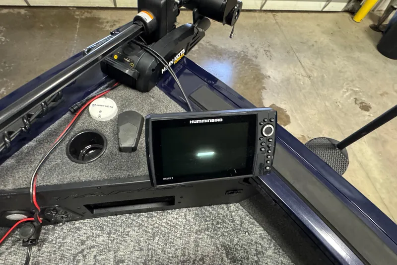 Slide: The Image of 2025 Tracker Targa V-19 WT boat with Humminbird Helix 9 fish finder and Minn Kota trolling motor. - 18