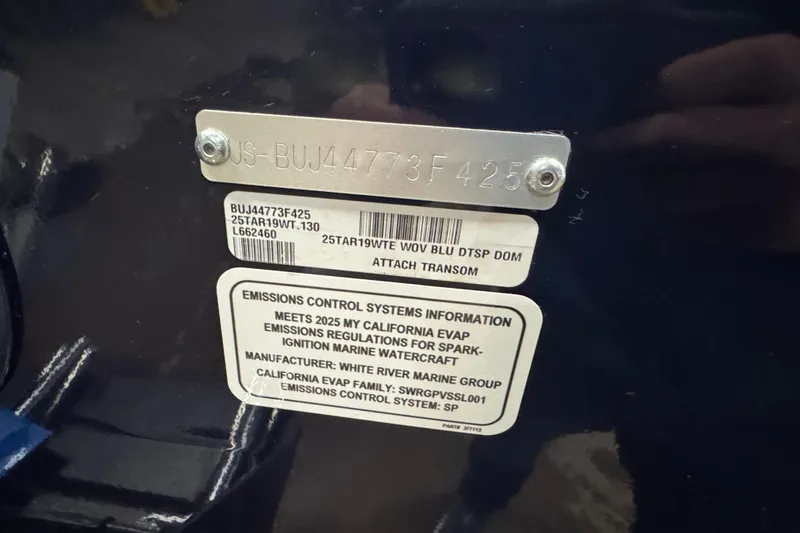 Slide: The Image of 2025 Tracker Targa V-19 WT emissions control and identification labels on transom. - 7