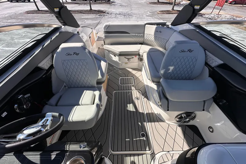 Slide: The Image of 2026 Sea Ray SLX 260 Outboard interior with luxurious seating and modern design. - 10
