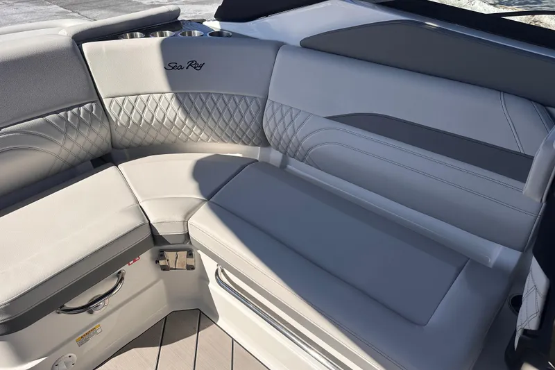 Slide: The Image of Luxurious seating on 2026 Sea Ray SLX 260 Outboard boat with elegant upholstery design. - 13