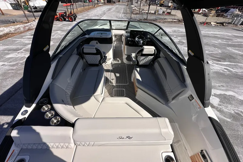Slide: The Image of 2026 Sea Ray SLX 260 Outboard boat interior with luxurious seating and modern design. - 15