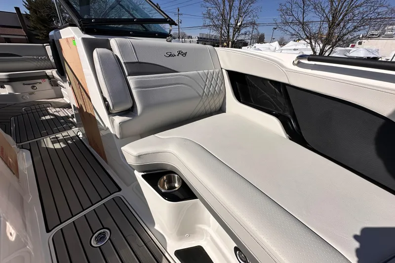Slide: The Image of 2026 Sea Ray SLX 260 Outboard boat interior with luxurious seating and sleek design. - 8