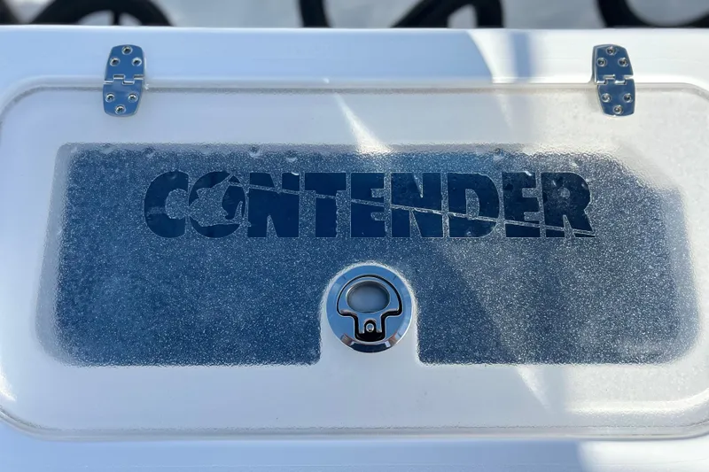 Slide: The Image of Contender 35 ST 2025 boat hatch with logo and latch detail. - 17