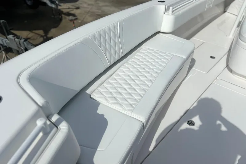 Slide: The Image of Luxury seating on 2025 Contender 35 ST boat with diamond-stitched upholstery. - 51