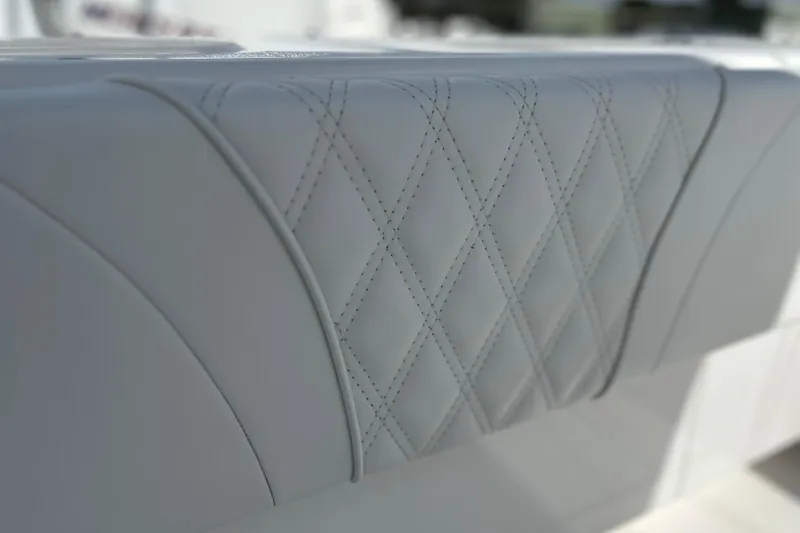 Slide: The Image of Diamond-stitched upholstery detail on 2025 Contender 35 ST boat seat. - 56