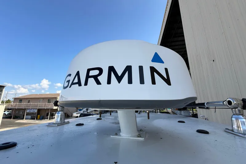 Slide: The Image of 2022 Tidewater 292 CC Adventure boat interior with toilet and equipment. - 24