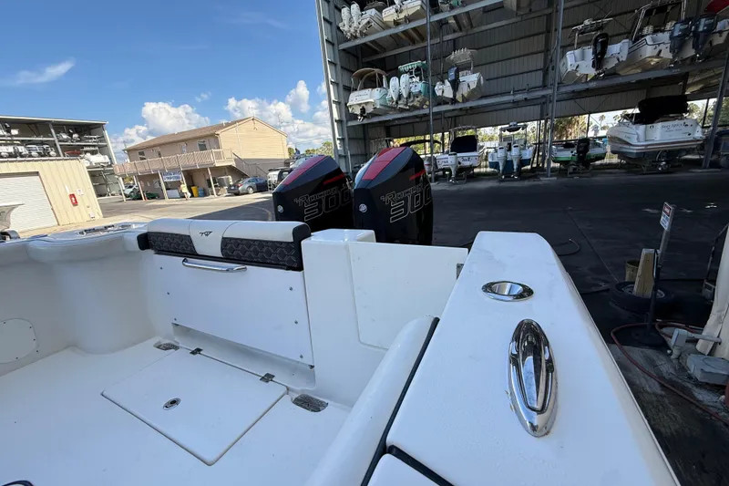 Slide: The Image of 2022 Tidewater 292 CC Adventure boat interior with JL Audio speakers and stylish upholstery. - 37