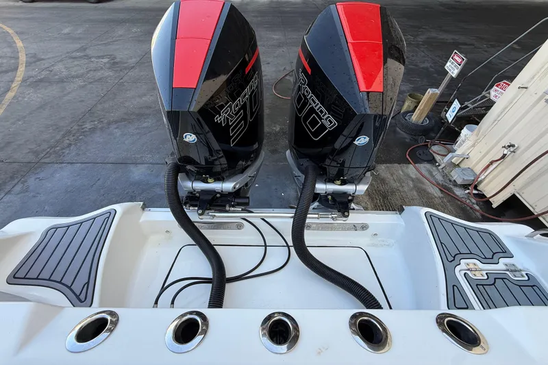 Slide: The Image of 2022 Tidewater 292 CC Adventure with dual Mercury Racing 300 outboard engines. - 44