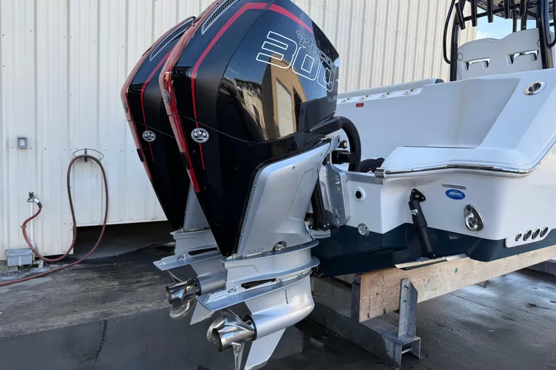 Slide: The Image of 2022 Tidewater 292 CC Adventure boat with dual powerful outboard engines. - 48