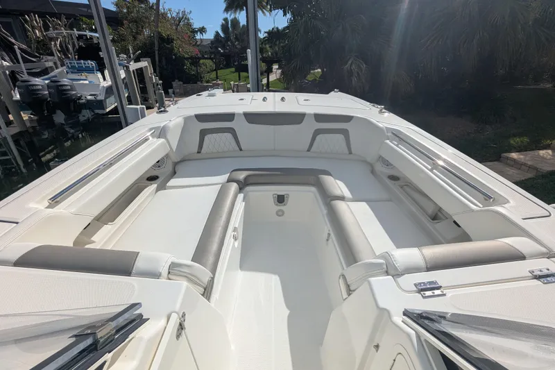 Slide: The Image of 2021 World Cat 280 DC-X boat interior with spacious seating and modern design. - 11