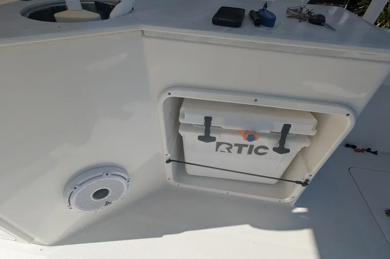 Slide: The Image of RTIC cooler on 2021 World Cat 280 DC-X boat with speaker and accessories. - 14
