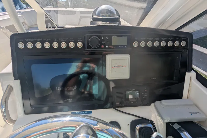 Slide: The Image of Control panel of 2021 World Cat 280 DC-X boat with Garmin navigation system. - 5