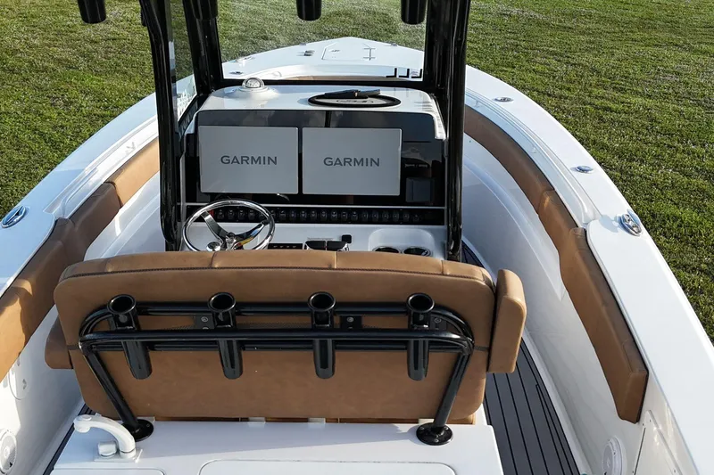 Slide: The Image of 2023 Seahunt 30 GameFish Coffin Box boat interior with dual Garmin displays. - 14