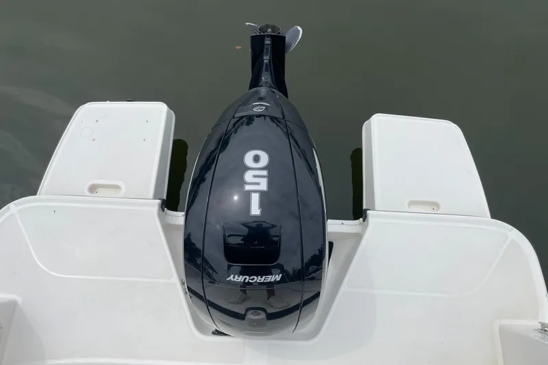 Slide: The Image of Bayliner DX 2200 boat with Mercury 150 outboard motor, 2023 model. - 5
