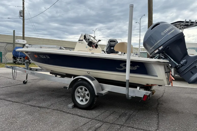 Slide: The Image of 2022 Scout 177 Sport boat on trailer with Yamaha outboard motor. - 3