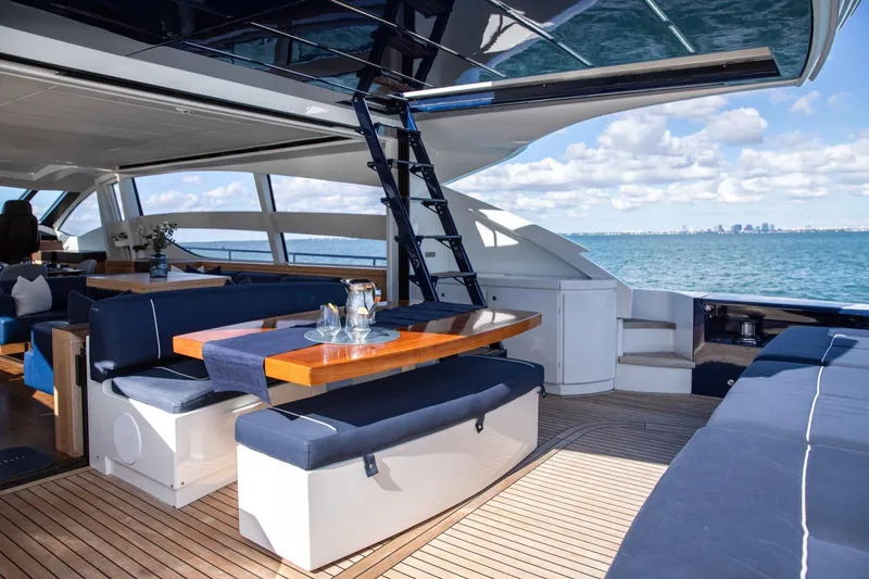 Slide: The Image of Luxurious 2012 Pershing Sport Boat interior with elegant seating and ocean view. - 2