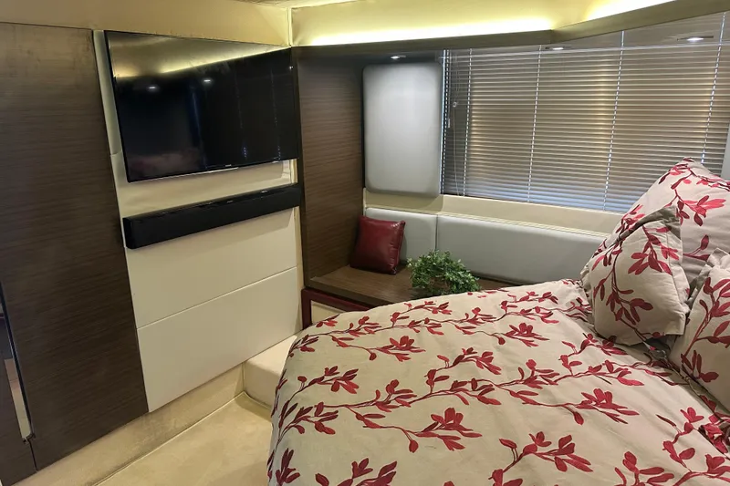 Slide: The Image of Luxurious bedroom interior of 2015 Azimut 55S yacht with floral bedding and modern TV. - 18