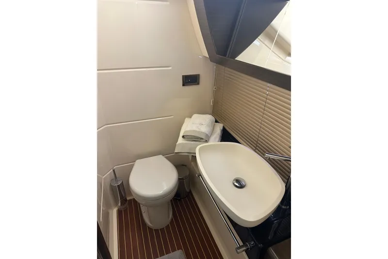 Slide: The Image of Luxurious bathroom in 2015 Azimut 55S yacht with modern sink and toilet. - 21