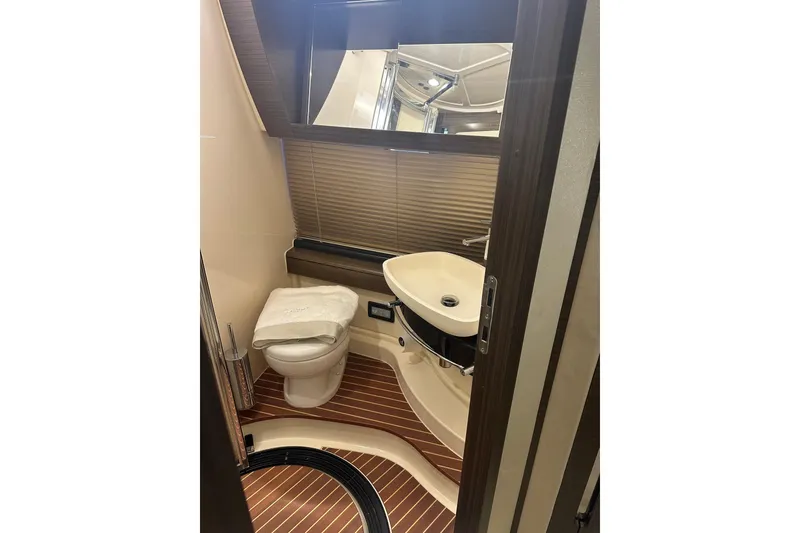 Slide: The Image of Luxurious bathroom in 2015 Azimut 55S yacht with modern fixtures and elegant design. - 23