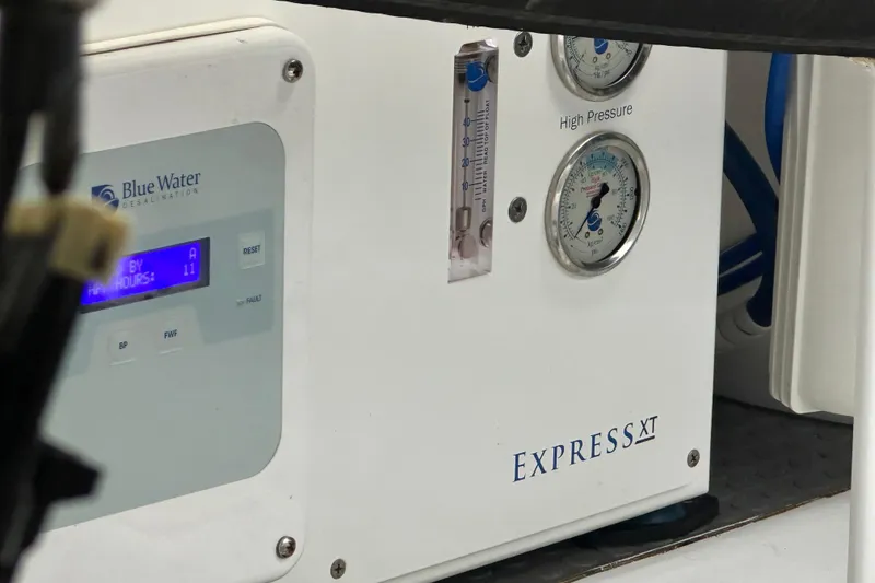 Slide: The Image of Control panel of Blue Water Desalination system on Belize 54 Day Bridge, 2023 model. - 35