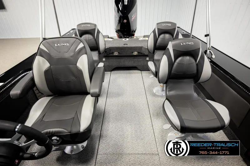 Slide: The Image of Interior of 2026 Lund 1975 Pro-V Sport boat with four cushioned seats. - 31