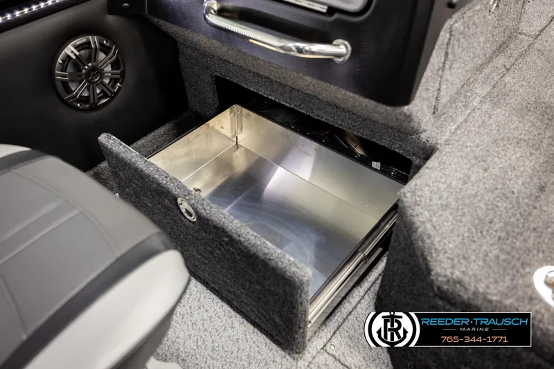 Slide: The Image of Open storage compartment in 2026 Lund 1975 Pro-V Sport boat interior. - 33