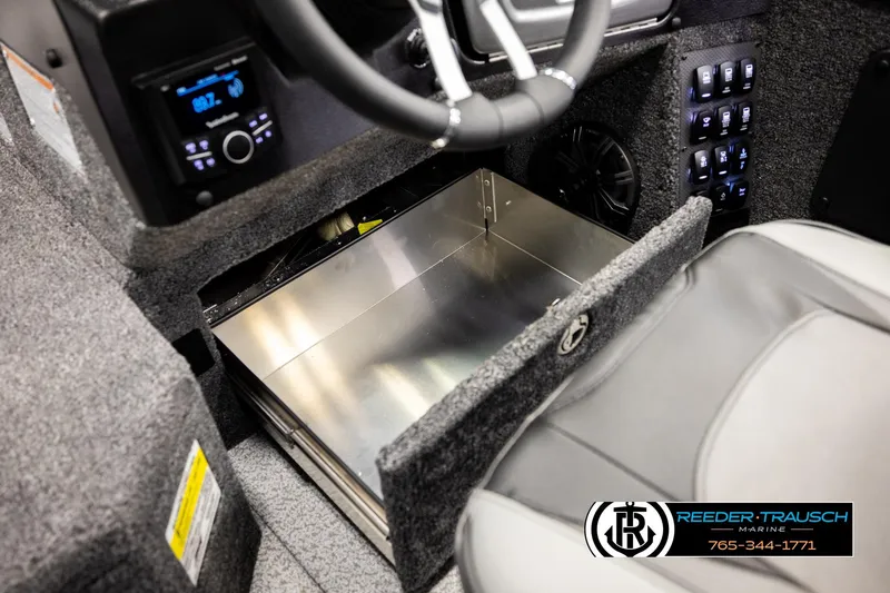 Slide: The Image of Interior of 2026 Lund 1975 Pro-V Sport boat with storage compartment and control panel. - 35