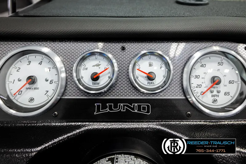 Slide: The Image of Dashboard of 2026 Lund 1975 Pro-V Sport boat with gauges and branding. - 40