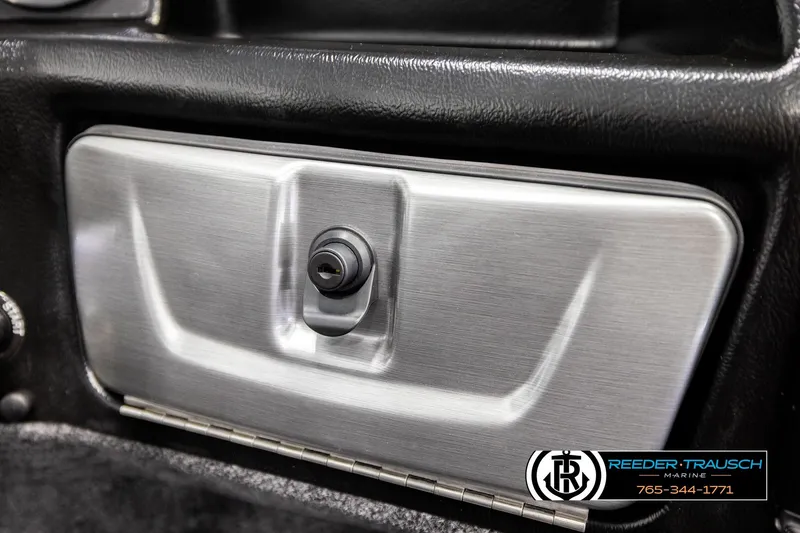 Slide: The Image of 2026 Lund 1975 Pro-V Sport dashboard detail with lockable compartment. - 41