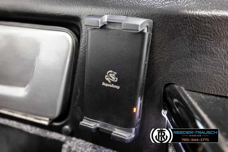 Slide: The Image of AquaAmp device in 2026 Lund 1975 Pro-V Sport boat interior, Reeder-Trausch Marine branding. - 42