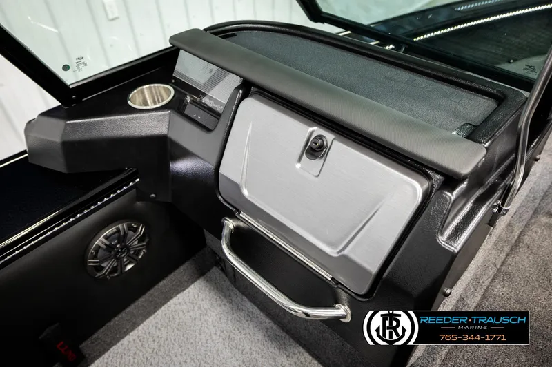 Slide: The Image of Interior of 2026 Lund 1975 Pro-V Sport boat with sleek dashboard design. - 46