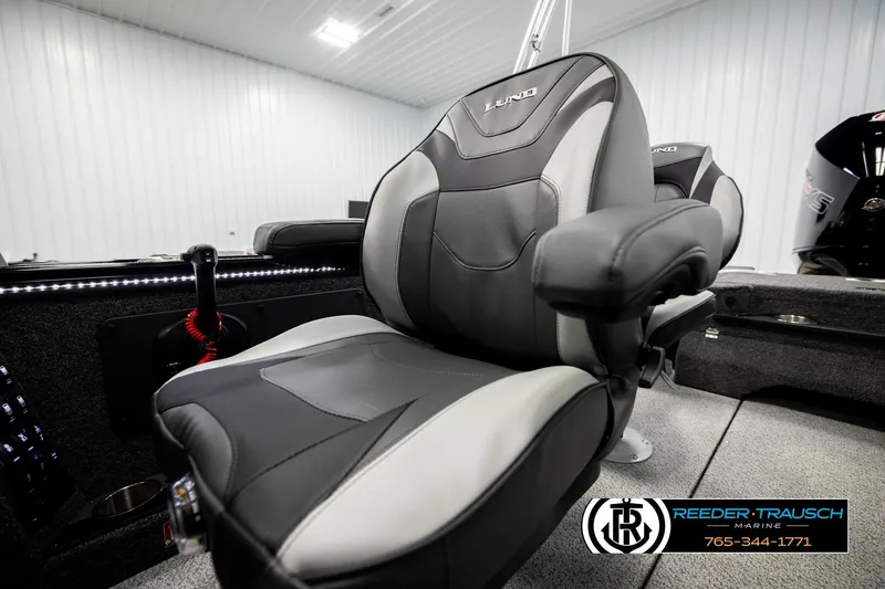 Slide: The Image of 2026 Lund 1975 Pro-V Sport boat seat in a modern interior setting. - 51