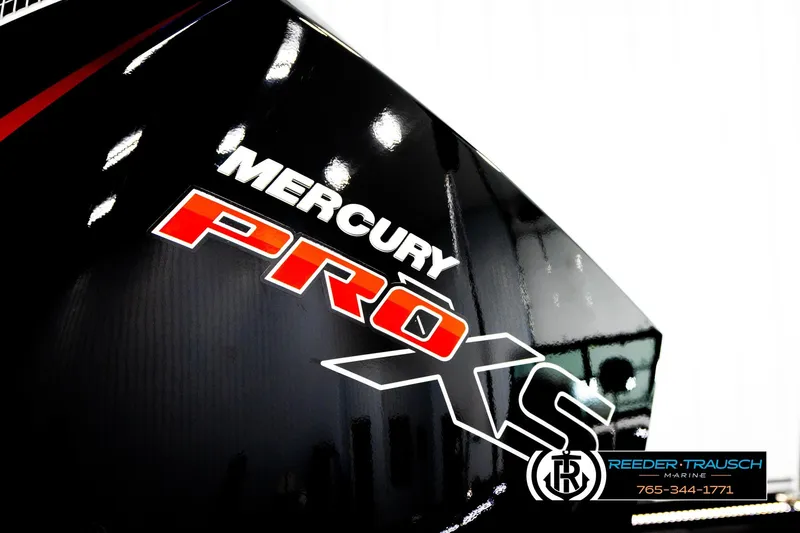 Slide: The Image of Close-up of Mercury Pro XS logo on 2026 Lund 1975 Pro-V Sport boat. - 54