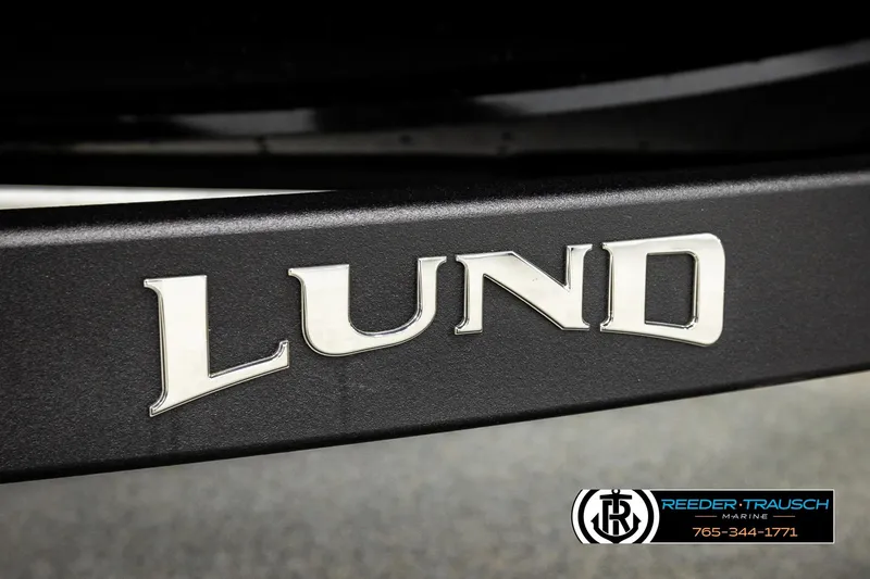 Slide: The Image of Close-up of Lund logo on 2026 Lund 1975 Pro-V Sport boat. - 57
