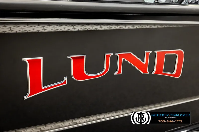 Slide: The Image of Close-up of 2026 Lund 1975 Pro-V Sport boat logo with red lettering. - 59