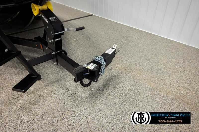 Slide: The Image of Trailer hitch of 2026 Lund 1975 Pro-V Sport boat on showroom floor. - 63