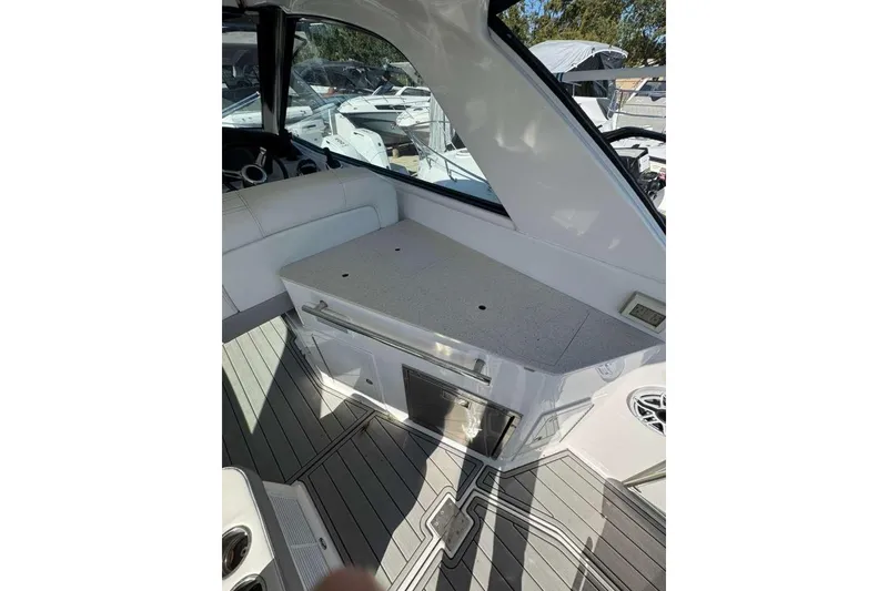 Slide: The Image of 2019 Regal 3350 Sport Cruiser interior with sleek seating and modern design. - 4