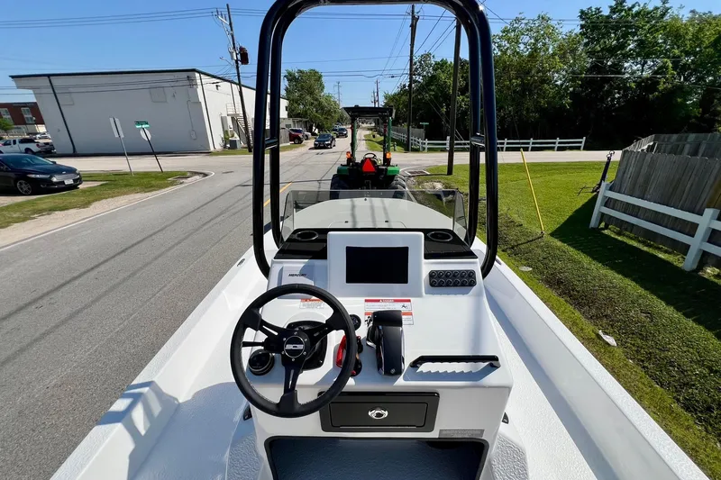 Slide: The Image of 2025 SCB S22 boat console on trailer, parked on a suburban street. - 10