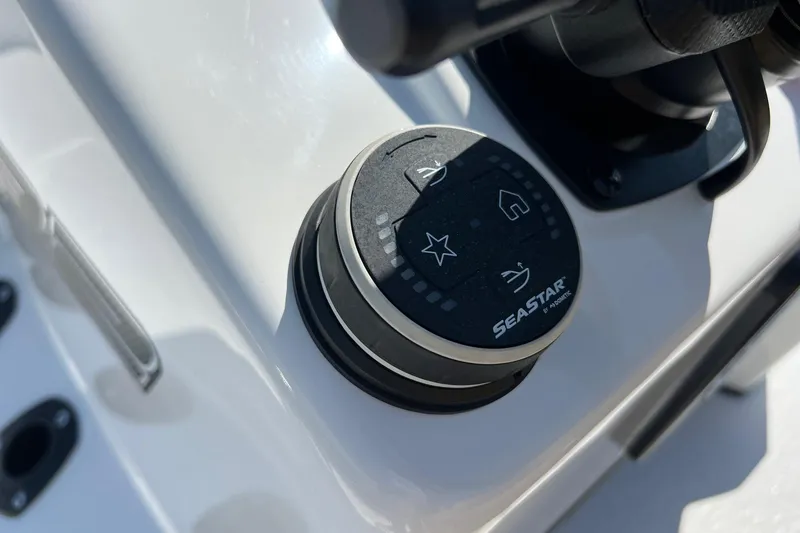 Slide: The Image of Close-up of SeaStar control knob on 2025 SCB S22 boat dashboard. - 16