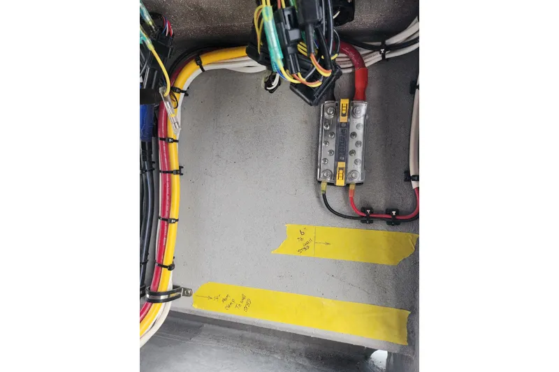 Slide: The Image of Electrical wiring setup in 2026 Custom Passenger Catamaran BYD34, featuring organized cables and connectors. - 10