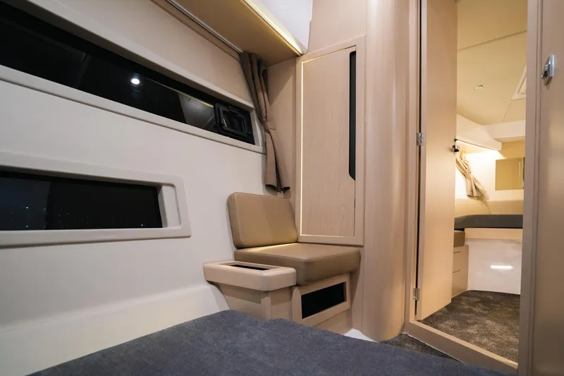 Slide: The Image of Luxurious interior of 2026 Aquador 400HT yacht, featuring modern seating and elegant design. - 18