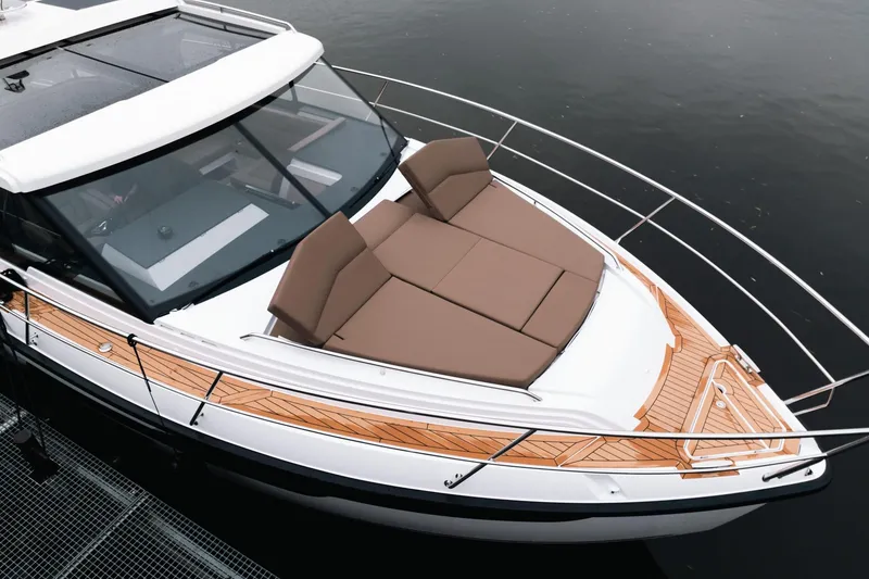 Slide: The Image of 2026 Aquador 400HT luxury yacht with sunbathing deck and sleek design. - 5