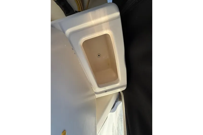 Slide: The Image of 2005 Pursuit 3070 Offshore boat interior compartment detail. - 20