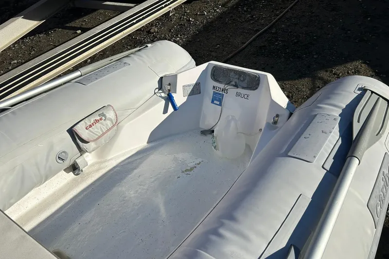 Slide: The Image of Inflatable Caribe C9 boat, 2005 model, with oars and storage pouch. - 3