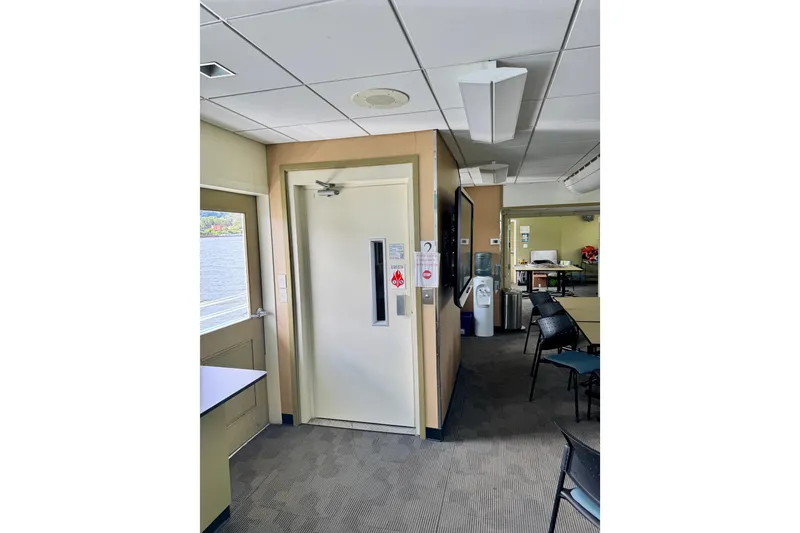 Slide: The Image of Interior of 2016 Custom Commercial Research Riverboat with elevator and seating area. - 10