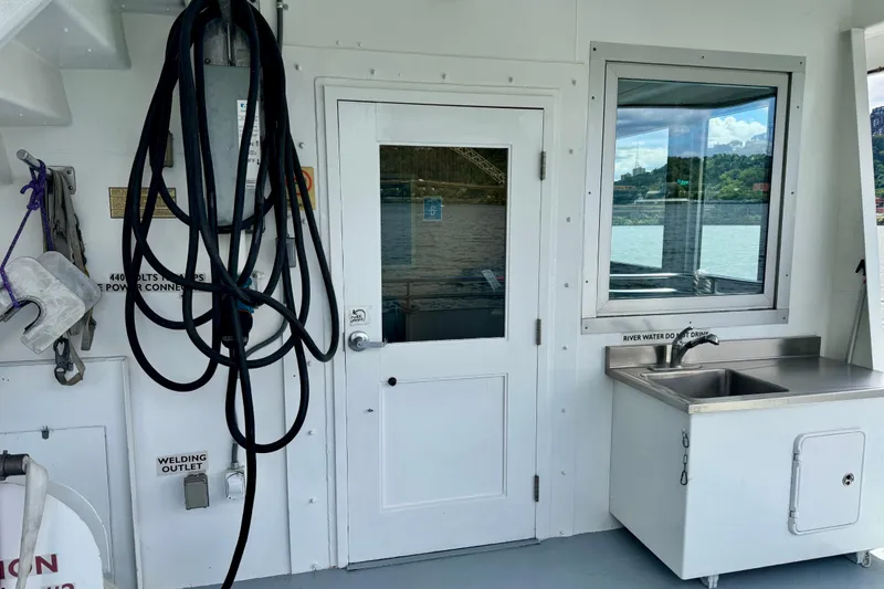 Slide: The Image of Interior of a 2016 custom commercial research riverboat with sink and equipment. - 7